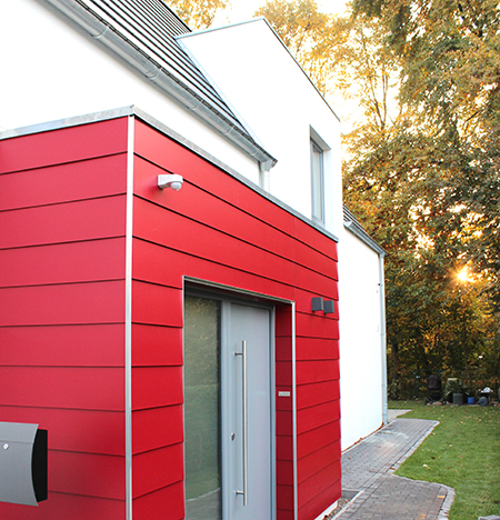 Neubau eines Einfamilienhauses in Ahrensburg mit Eingangsbereich farblich gestaltet Neubau eines Einfamilienhauses in Ahrensburg mit Eingangsbereich farblich gestaltet